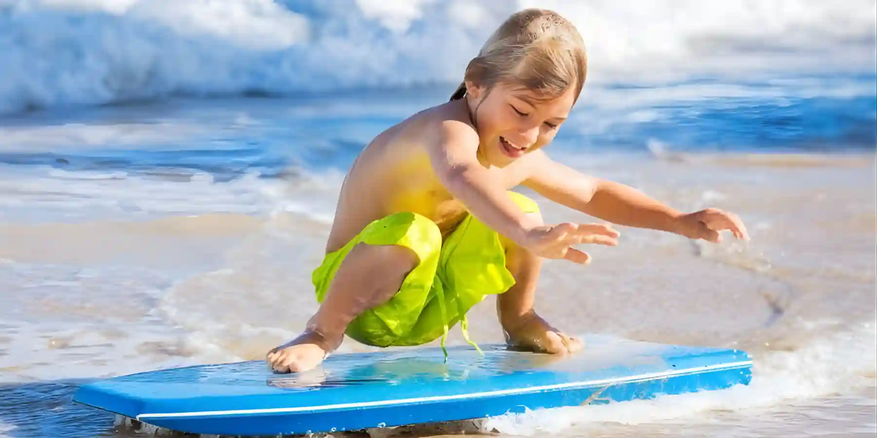 boy boogieboarding